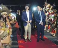  ?? ADRIAN WYLD / THE CANADIAN PRESS ?? Prime Minister Justin Trudeau is greeted by Charles Abel, Deputy Prime Minister of Papua New Guinea, as he arrives in the capital Port Moresby on Friday.