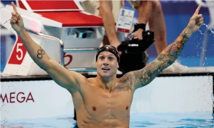  ?? Photograph: Molly Darlington/Reuters ?? Caeleb Dressel of the United States celebrates after winning the 100m freestyle.