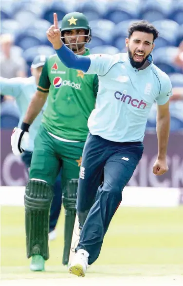  ?? Agence France-preses ?? England’s Saqib Mahmood celebrates after taking the wicket of Pakistan’s Babar Azam for a duck during their first ODI match in Cardiff on Thursday.