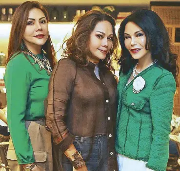  ??  ?? Ching Cruz (right) with Cynthia and Ivy Almario of Atelier Almario, who designed the interiors of Bloom
