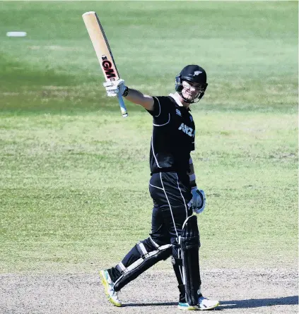  ?? PHOTO: GETTY IMAGES ?? Where there’s a Will . . . New Zealand XI batsman Will Young celebrates scoring a century during the World Cup warmup match against the Australian XI at Allan Border Field in Brisbane yesterday.