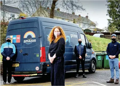  ?? Picture: Athena Pictures ?? From left, John Dixon, operations manager, Gemma Wray of Emmaus, driver Nathan Logan and Wayne Stephens, yellow director, as Emmaus South Wales receives a donation as part Amazon’s programme to support the communitie­s around its operating locations across the UK.