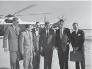  ?? Bill Allen / Associated Press ?? President John F. Kennedy poses with members of his party before departing after his historic speech.