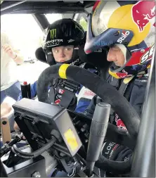  ??  ?? Loeb offered rallying pointers to the younger Solberg