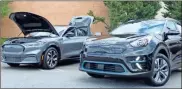 ?? Aleks Gilbert, File ?? This file photo shows electric cars from Ford and Kia, the Mustang Mach-e and Niro.