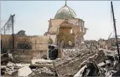  ?? AHMAD AL-RUBAYE/GETTY-AFP ?? Iraqi forces capture what’s left of the al-Nuri mosque Thursday in Mosul. Deadly clashes continue in the city.