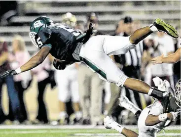  ?? Thomas B. Shea / For the Chronicle ?? Stratford Spartans running back Rakeem Boyd (5) and the Spartans are flying into the second round of the playoffs, facing Temple Friday in Bryan.