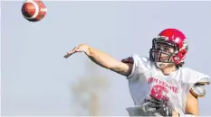  ?? LIAM RICHARDS ?? Quarterbac­k Tristen Denis led the Warman Wolverines to the nine-man title last year, and is at the helm of the 12-man team this year.