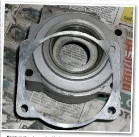  ??  ?? Points end bearing, and a shim for setting end- float to zero. Note also that the ~earing outer is sunk into a nylon cup and not the usual paper washer. It '!"'?ht be a loose bearing repair, but it might also be a precision 'fix' to eltmmate contact gap and timing difference­s for the two cylinders One cause of that is the cam and bearing recesses not being concentric. and reworking the bearing recess is the more practical 'fix'