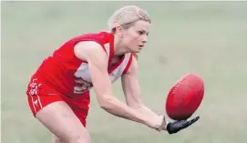  ?? JEAN LEVAC/OTTAWA CITIZEN ?? Emma Dickinson, of the Ottawa Swans women’s Aussie Rules Football team, dreams of competing in the Internatio­nal Cup at the Melbourne Cricket Grounds in Australia in 2014.