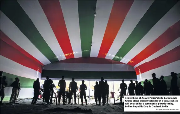  ?? Anupam Nath/Associated Press ?? Members of Assam Police’s Elite Commando Group stand guard yesterday at a venue which will be used for a ceremonial parade today, Indian Republic Day, in Gauhati, India