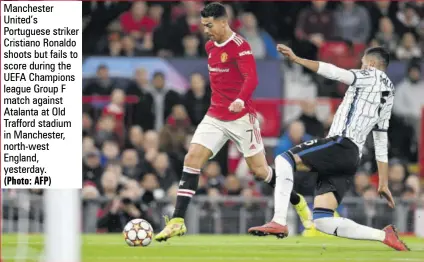  ?? (photo: afp) ?? Manchester United’s Portuguese striker Cristiano Ronaldo shoots but fails to score during the UEFA Champions league Group F match against Atalanta at Old Trafford stadium in Manchester, north-west England, yesterday.