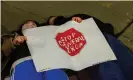  ?? Photograph: Dominic Gwinn/ZUMA Wire/ REX/Shuttersto­ck ?? Chicago activists lie on the street as part of Thursday’s protest. Their sign reads ‘Stop General Iron’, referring to the metal shredder on the North Side that closed last year.