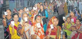  ?? HT FILE ?? Women show their voter IDs before casting vote in Kolkata, West Bengal.