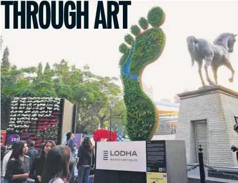  ??  ?? The Footprint installati­on by artist Vikram Arora at the Hindustan Times Kala Ghoda Arts Festival (above); the artwork seen from a different angle (above, right)