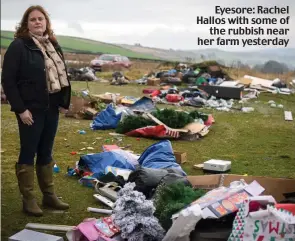  ??  ?? Eyesore: Rachel Hallos with some of the rubbish near her farm yesterday