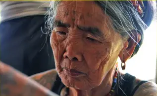  ?? Photo by Milo Brioso ?? LIVING TREASURE. Often described as the "last" and oldest mambabatok, Whang-od also also known as Maria Oggay from the tribe of Butbut in Buscalan, Kalinga will be given recognitio­n by National Commission for Culture and the Arts (NCCA).