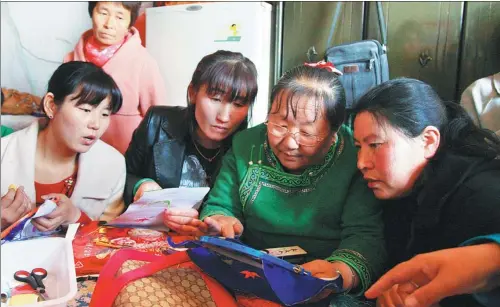  ?? PHOTOS PROVIDED TO CHINA DAILY ?? Women take part in an embroidery class in the Inner Mongolia autonomous region’s Horqin Right Wing Middle Banner to learn how to decorate clothes, slippers and pillowcase­s with traditiona­l designs.