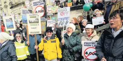  ??  ?? ●●Protesters against the green belt plans outside Stockport Town Hall on Saturday