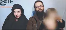  ?? CAPTIVES: Caitlan Coleman, and her Canadian husband Joshua Boyle, holding their children, in an undated video grab. Picture: AFP ??