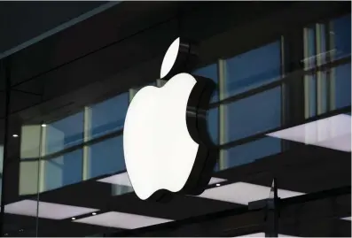  ?? Brent Lewin/ Bloomberg ?? ABOVE:
The Apple logo is displayed outside
the Apple Store on Aug.
22, 2019, at Yorkdale Mall in Toronto.
Apple is preparing to announce a shift to its own main processors in Mac computers next week at its Worldwide Developers Conference.