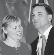  ?? CANADIAN PRESS FILES ?? Ontario Tory Leader Tim Hudak with his wife, Deb Hutton, on June 12 where he announced he will be stepping down as party leader after being defeated in the provincial election.