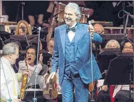  ?? Timothy Norris ?? ANDREA BOCELLI gets a laugh from the Bowl orchestra at Sunday’s show.