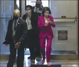  ?? J. SCOTT APPLEWHITE — THE ASSOCIATED PRESS ?? Speaker of the House Nancy Pelosi, D-Calif., arrives at the Capitol in Washington on Friday.