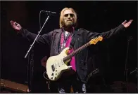  ?? (AP) ?? Tom Petty and the Heartbreak­ers performed in 2017 in San Diego.