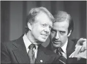  ?? BARRY THUMMA — THE ASSOCIATED PRESS FILE ?? President Jimmy Carter listens to Sen. Joseph R. Biden, D-Del., as they wait to speak at fund raising reception at Padua Academy in Wilmington, Del., in February 1978.