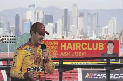  ?? AP PHOTO/ASHLEY LANDIS ?? NASCAR Cup Series driver Joey Logano speaks to reporters ahead of practice sessions before a NASCAR exhibition auto race at Los Angeles Memorial Coliseum, on Saturday in Los Angeles.