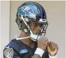  ?? KENNETH K. LAM/BALTIMORE SUN ?? Rookie quarterbac­k Lamar Jackson was drafted with the last pick in the first round and will compete for a backup role.