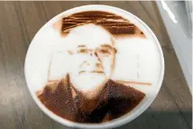  ??  ?? Rob Maetzig’s dial in chocolate on the froth of his cup of cappuccino.