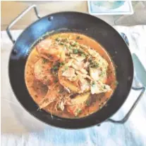  ?? PHOTO BY T.TSENG ?? Whole GA shrimp a la plancha, sopping toast, arbol chili butter, lime at The Optimist in Atlanta.