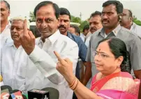  ?? PTI ?? AIMIM president Asaduddin Owaisi after casting his vote in Hyderabad on Friday. On right, Telangana caretaker Chief Minister K Chandrasek­har Rao and his wife Shobha show their ink-marked fingers. —