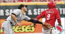  ??  ?? Jose Peraza seems to be the choice at shortstop, but after a great September in 2016, Peraza was a disappoint­ment last year.