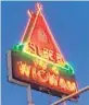  ?? JOY WALLACE DICKINSON ?? The neon sign advertisin­g Historic Wigwam Village No. 2 in Cave City, Kentucky, has recently been refurbishe­d.