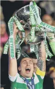  ??  ?? Scott Brown lifts the cup.