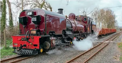  ?? CHRIS PARRY ?? Peter Best’s NGG16 articulate­d Beyer Garratt No. 130, the latest locomotive to be restored to steam in Wales, undergoes running-in on the Welsh Highland Railway on March 25, all set to enter traffic in the new season.