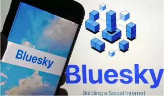  ?? ?? The app for Bluesky is shown on a mobile phone, left, and on a laptop screen, Friday, June 2, 2023, in New York.