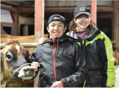  ??  ?? YOUNG FARMERS: Daisuke and Nana Shimizu, a young couple running a dairy farm in a village in Japan’s northeaste­rn Fukushima Prefecture.