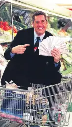  ?? Pictures: PA. ?? Dale Winton with David Walliams, in a shopping trolley on the set of game show Supermarke­t Sweep and arriving at the British Comedy Awards in 1997.