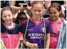  ??  ?? Aoife O’Keefe, Lucía Casares and Marina Lopez Rubio cheering on their heroes at the Fitzgerald Stadium.