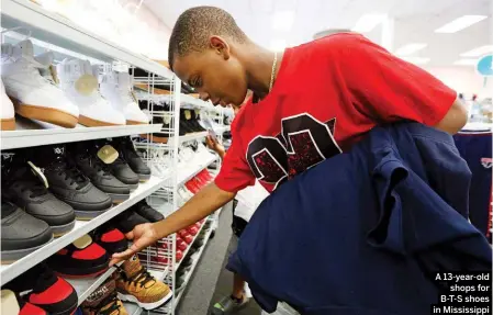  ?? A 13-year-old shops for B-T-S shoes in Mississipp­i ??