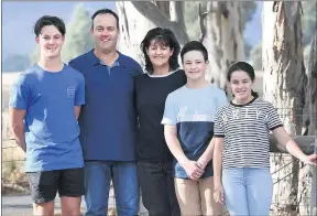  ?? Picture: PAUL CARRACHER ?? FOREVER INDEBTED: Telangatuk East’s Rees family, from left, Joel, Luke, Karen, Alex and Mia will be forever grateful to Royal Children’s Hospital staff for the life-saving treatment they gave to Joel after he suffered a stroke, aged 3.