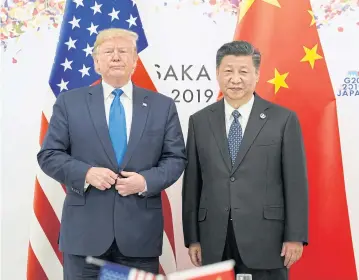  ?? REUTERS ?? US President Donald Trump poses for a photo with Chinese President Xi Jinping in Osaka, Japan in June.
