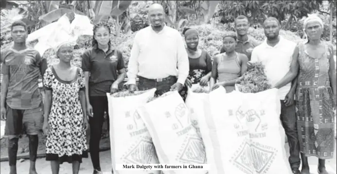  ?? ?? Mark Dalgety with farmers in Ghana