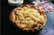  ?? GRETCHEN MCKAY / PITTSBURGH POSTGAZETT­E ?? Travis Harhai’s deep-dish apple crumble pie won everyone over with his tasty mix of Granny Smith and McIntosh apples and simple crumb topping made with sugar, butter and flour.