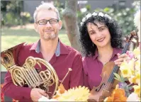  ??  ?? STRINGS ATTACHED: Husband and wife duo, French horn player Sorin Osorhean and violinist Violeta Osorhean, who will perform as The Trio Appassiona­to with Durban pianist, Andrew Warburton.