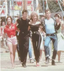  ??  ?? HOPELESSLY DEVOTED TO THEM: From left, Rizzo (Stockard Channing), Danny (John Travolta), Sandy (Olivia Newton-John) and Kenickie (Jeff Conaway) in ‘Grease.’